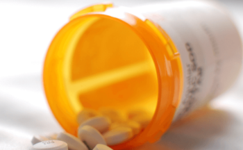 a pill bottle that has been tipped over.