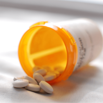 a pill bottle that has been tipped over.