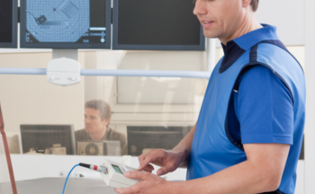 A man operates an xray machine