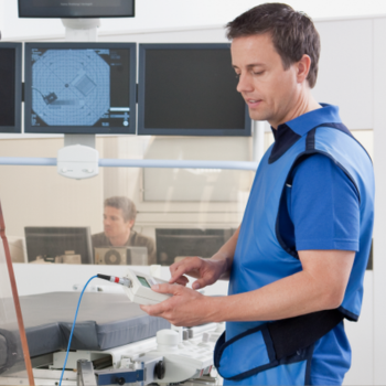 A man operates an xray machine